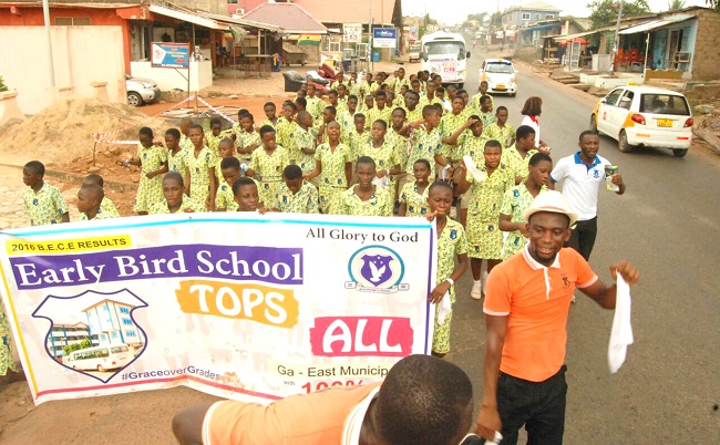 Students of the Early Bird School on a route march to celebrate the school’s achievement Students of the Early Bird School on a route march to celebrate the school’s achievement